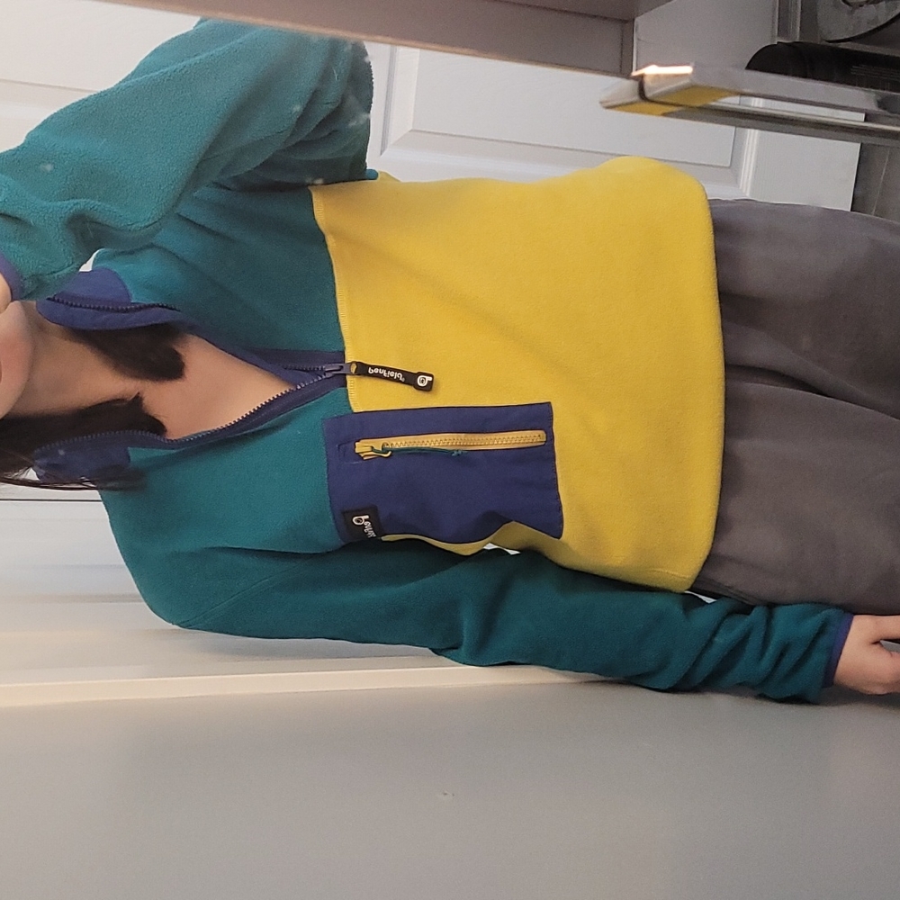 Penfield Fleece in yellow, green, and blue